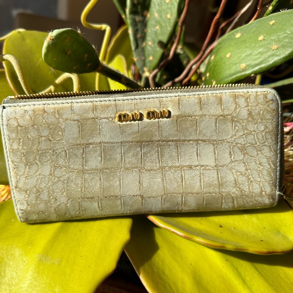 MUI MUI zip around wallet. EUC. Pale Green  Snake-like print on outside,